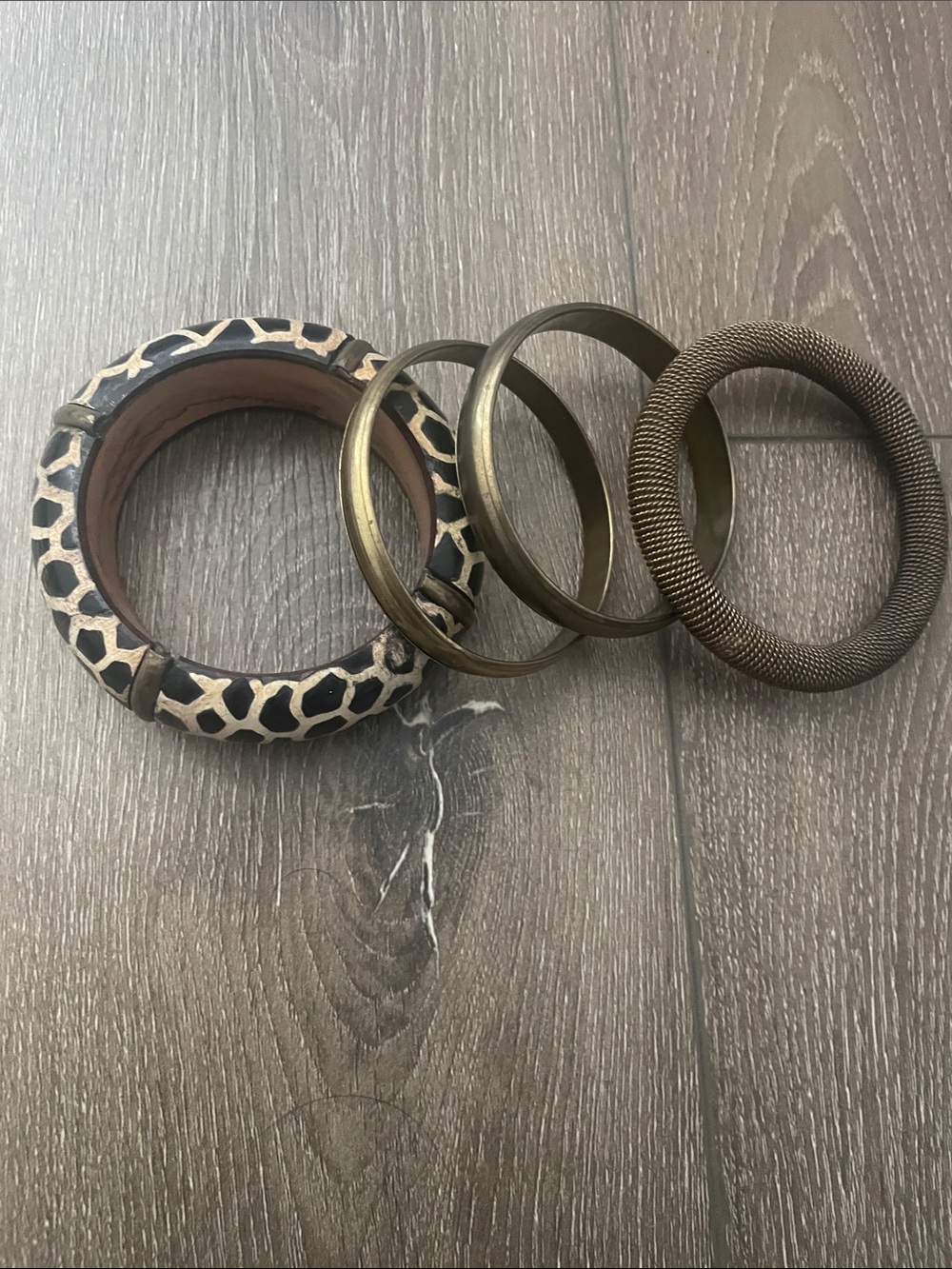 Set of Four Women's Black and Bronze Bangle Bracelets